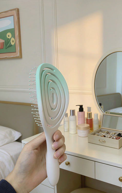 cushion brush versatile hair tool featuring flexible bristles set in a soft