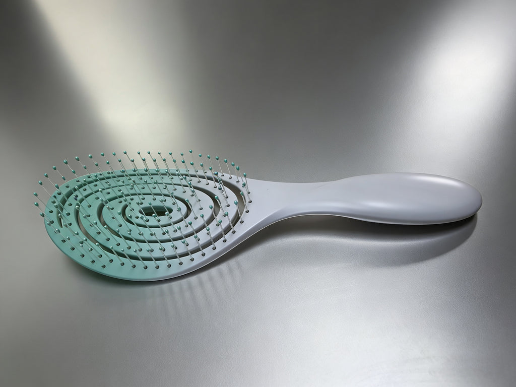 cushion brush versatile hair tool featuring flexible bristles set in a soft